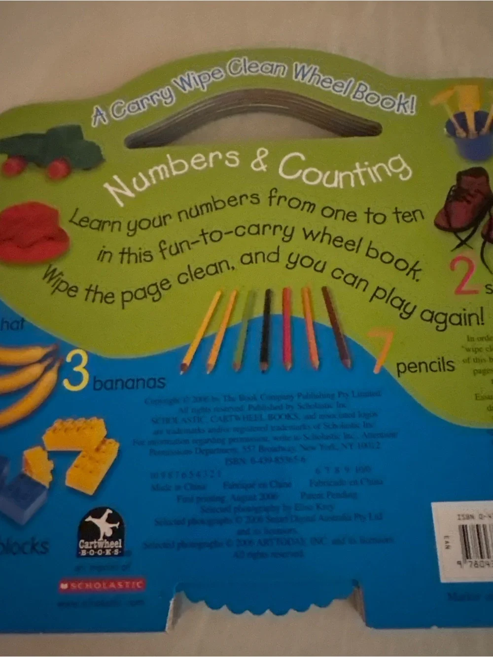 Scholastic Numbers & Counting Wheel Book - Green, Blue, Yellow, Red